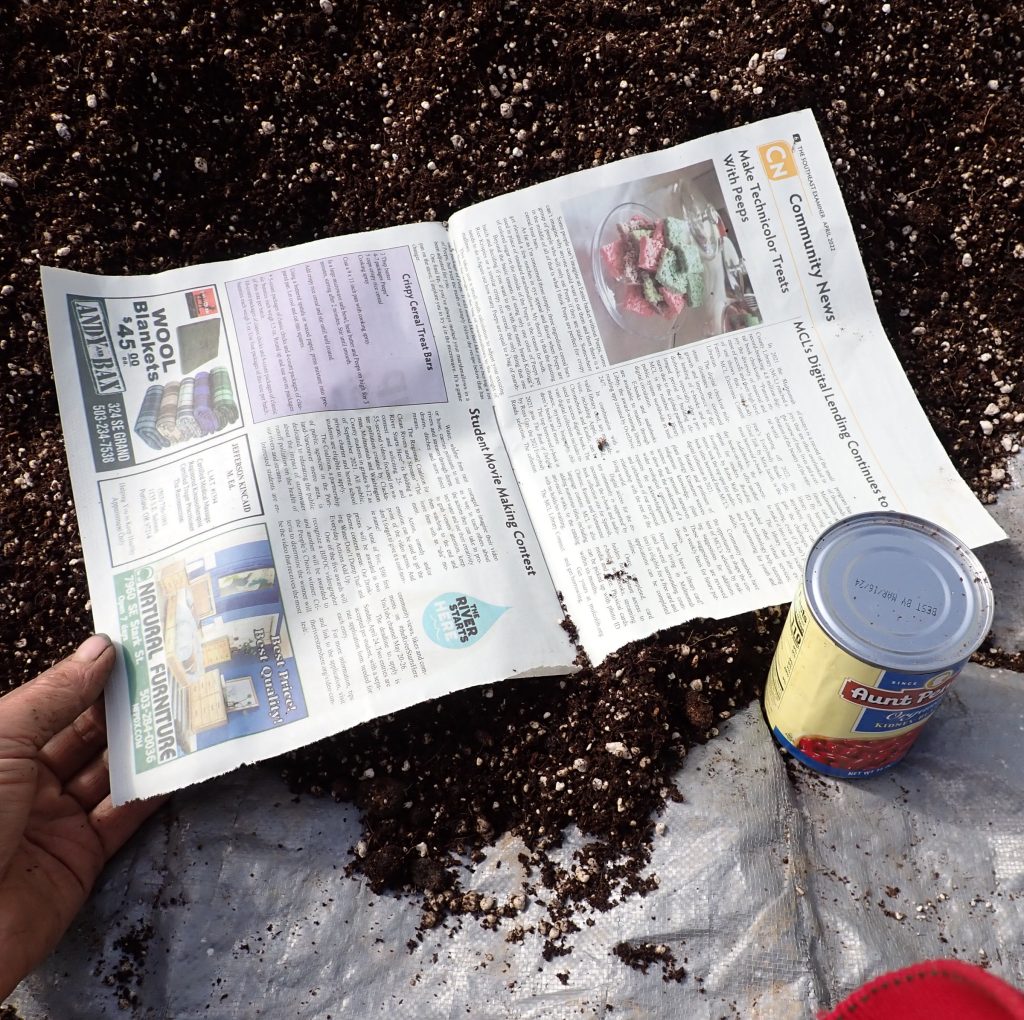 Newspaper and soup can
